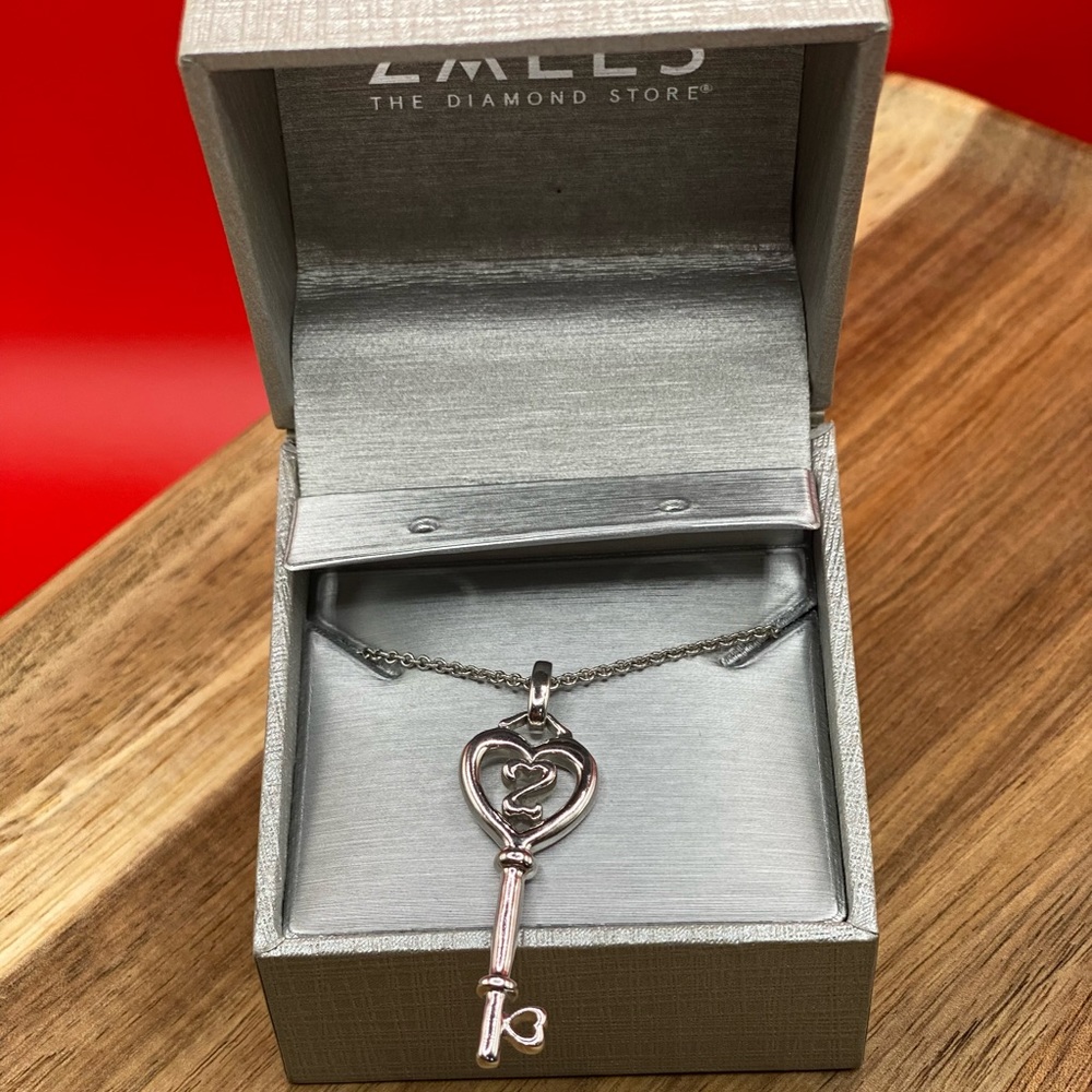 Open Heart Pendant on 925 Sterling Silver 18” Chain.